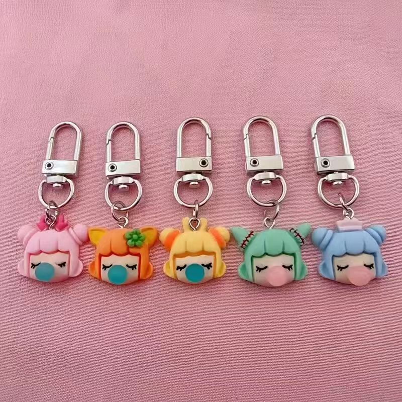 Gaming Accessories Gifts - พวงกุญแจเรซินรูปเด็กผู้หญิง 5 ชิ้น เหมาะสำหรับตกแต่งกระเป๋าและอุปกรณ์ในรถยนต์ เป็นของขวัญที่ดีเยี่ยม